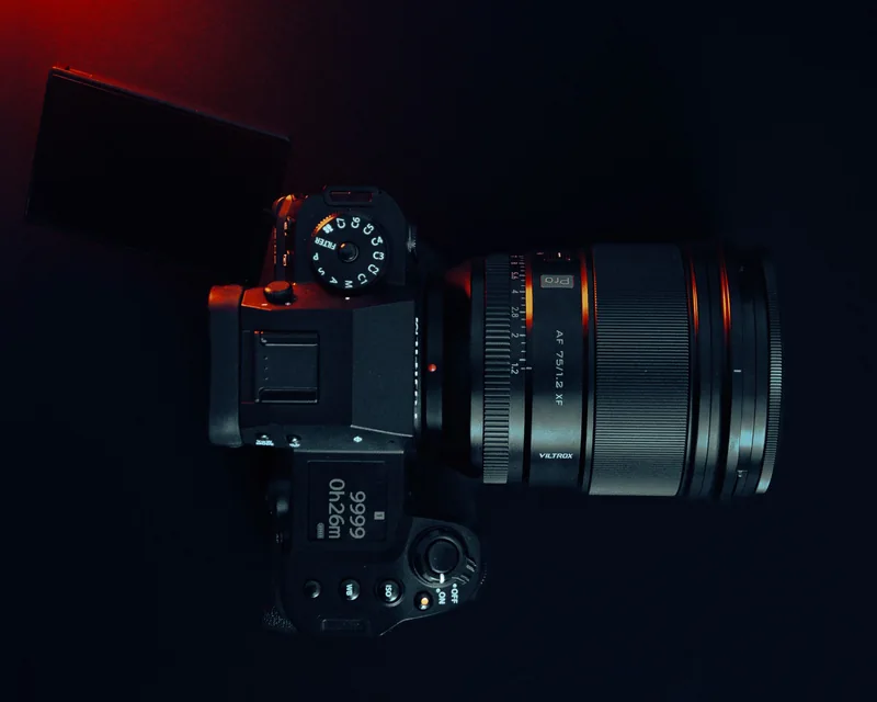 Professional camera photographed in studio lighting — illustrative stock reference